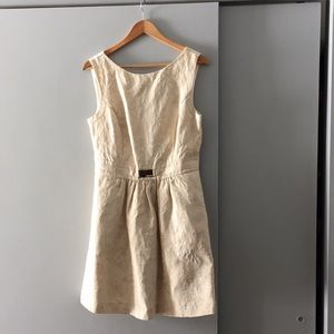 Jennifer Lopez gold and cream brocade dress